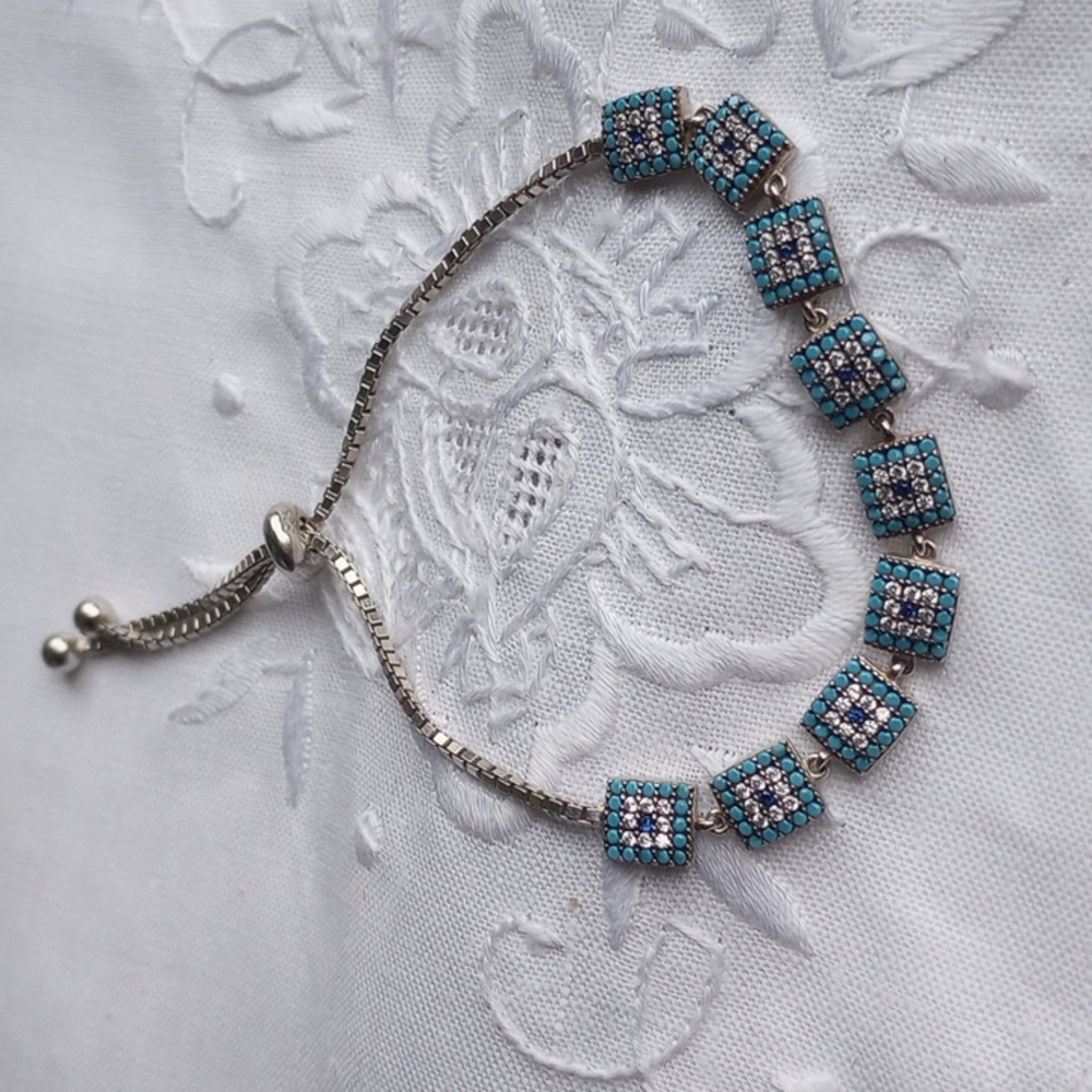 Square blue rhinestone evil eye silver tone and bolo bracelet